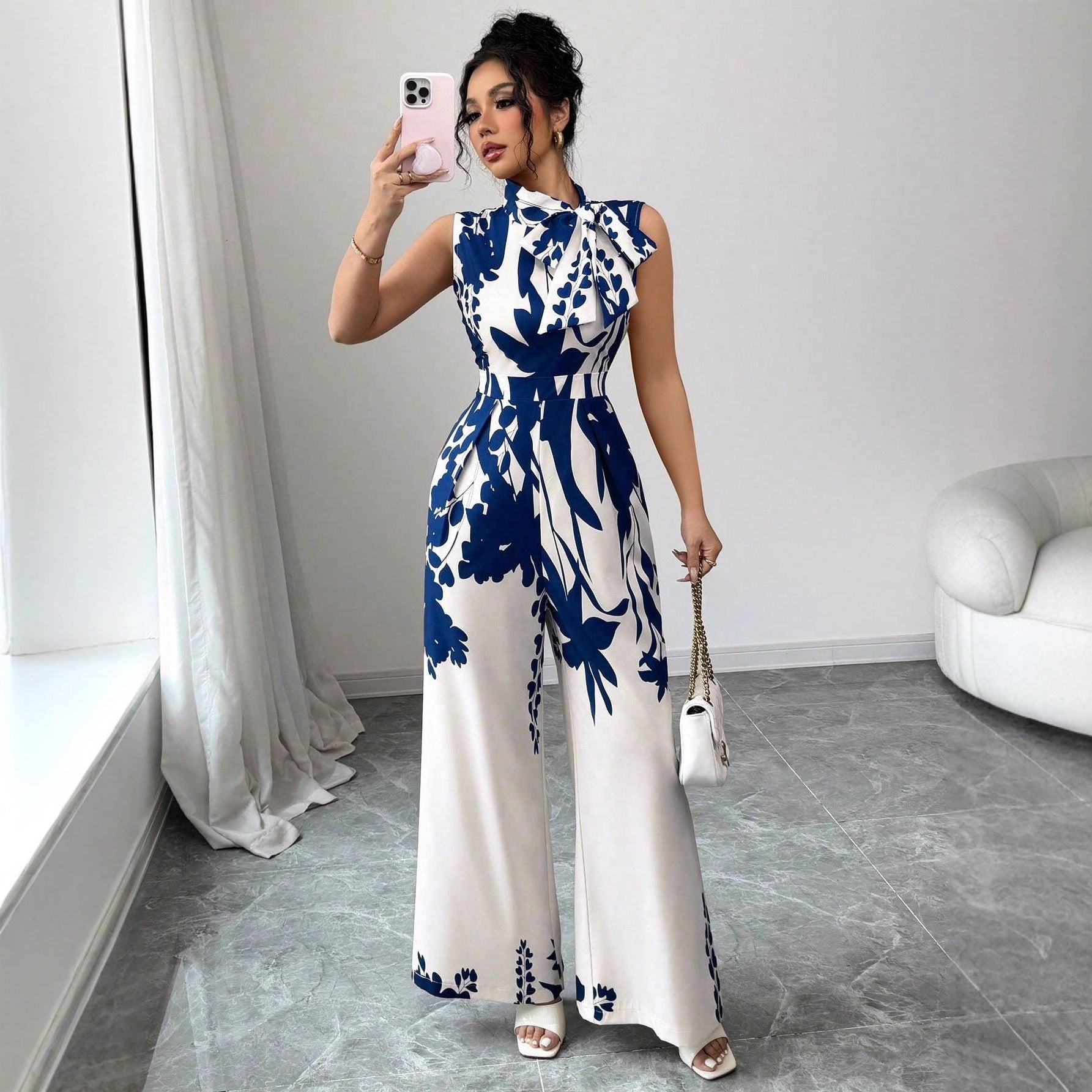 Elegant Womens Sleeveless Wide-Leg Jumpsuit With Floral Print And Lace-Up Details