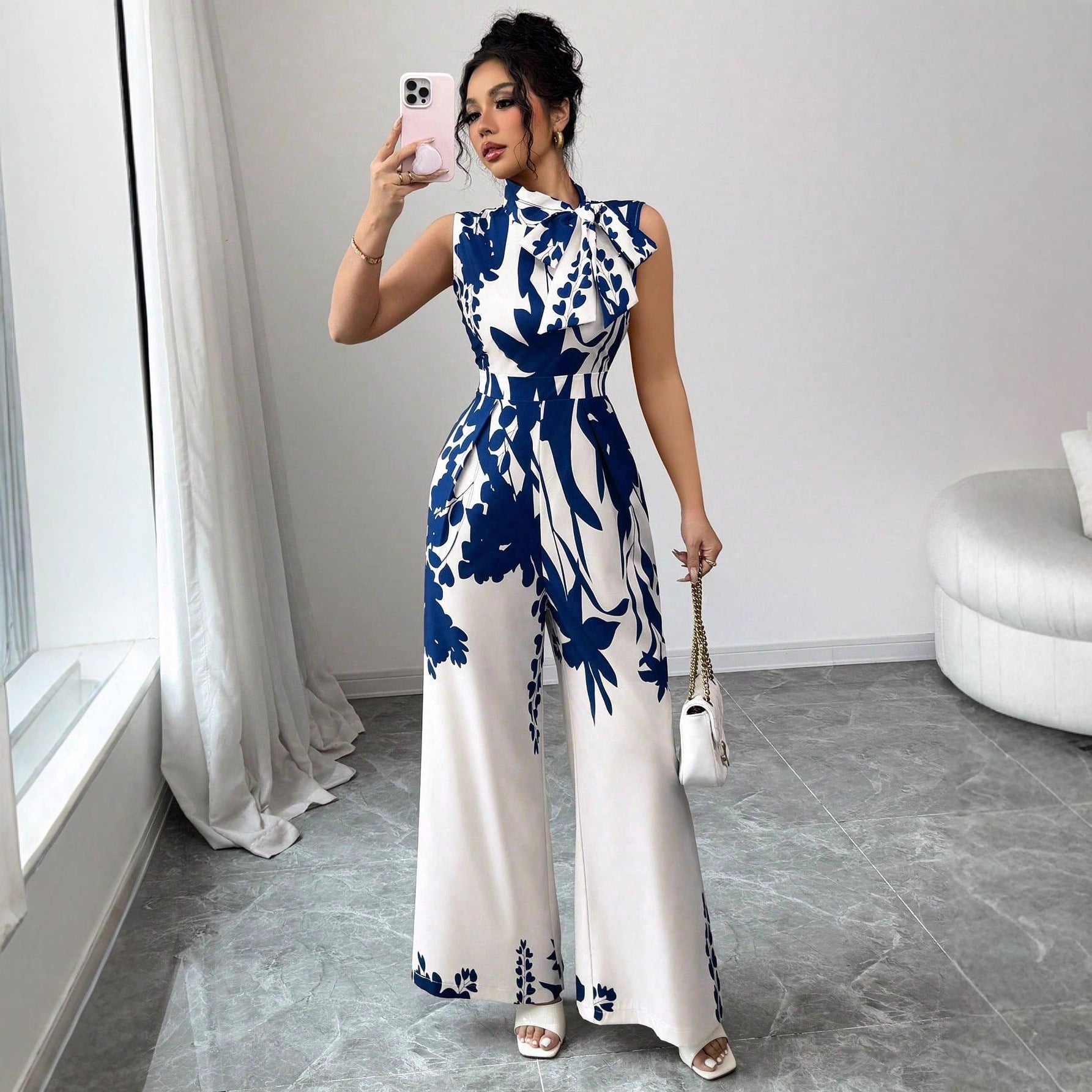 Elegant Womens Sleeveless Wide-Leg Jumpsuit With Floral Print And Lace-Up Details